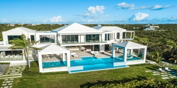 The heated, beachfront, swimming pool of Triton Luxury Villa, Long Bay Beach, Providenciales (Provo), Turks and Caicos Islands, B.W.I.